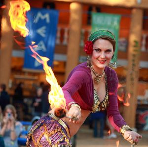 Woman fire dancer, taken by Frank Kovalchek, Wikimedia Commons